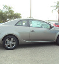 kia forte 2012 lt  gray coupe ex gasoline 4 cylinders front wheel drive 6 speed manual 32901