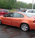pontiac grand am 2004 orange sedan gt1 gasoline 6 cylinders front wheel drive automatic 08812