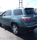 gmc acadia 2010 dk  green suv slt 1 gasoline 6 cylinders front wheel drive automatic 28557