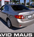 toyota corolla 2010 gold sedan le gasoline 4 cylinders front wheel drive automatic 32771