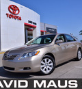 toyota camry 2009 gold sedan xle gasoline 4 cylinders front wheel drive automatic 32771