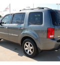 honda pilot 2011 dk  gray suv touring gasoline 6 cylinders front wheel drive automatic with overdrive 77065