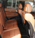 jeep grand cherokee 2011 beige suv overland gasoline 6 cylinders 2 wheel drive automatic 76210