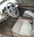 nissan maxima 2004 white sedan 3 5 sl gasoline 6 cylinders front wheel drive automatic 80905