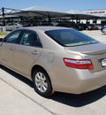 toyota camry 2009 gold sedan xle gasoline 4 cylinders front wheel drive automatic 76087