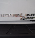 honda ridgeline 2012 white rtl gasoline 6 cylinders 4 wheel drive automatic 28557
