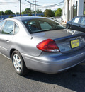 ford taurus 2006 silver frost sedan se gasoline 6 cylinders front wheel drive automatic 07724