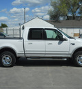 ford f 150 2001 off white lariat gasoline 8 cylinders 4 wheel drive automatic with overdrive 99212