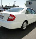 toyota camry 2002 white sedan xle v6 gasoline 6 cylinders front wheel drive automatic with overdrive 98371