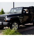 jeep wrangler unlimited 2011 black suv sahara gasoline 6 cylinders 4 wheel drive automatic 99352