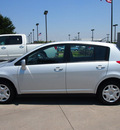 nissan versa 2011 silver hatchback gasoline 4 cylinders front wheel drive automatic with overdrive 76018