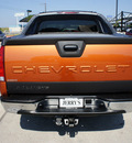 chevrolet avalanche 2005 orange lt flex fuel 8 cylinders 4 wheel drive automatic 76087