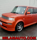 scion xb 2004 orange wagon gasoline 4 cylinders dohc front wheel drive automatic with overdrive 98371