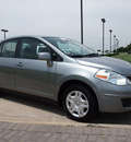 nissan versa 2011 dk  gray sedan gasoline 4 cylinders front wheel drive automatic with overdrive 76018
