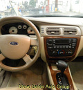 ford taurus 2006 tan sedan sel gasoline 6 cylinders front wheel drive automatic 14304
