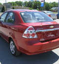 chevrolet aveo 2010 red sedan lt gasoline 4 cylinders front wheel drive automatic 62863
