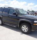 chevrolet tahoe 2010 black suv gasoline 8 cylinders 4 wheel drive automatic 77388