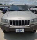 jeep grand cherokee 2004 tan suv special edition gasoline 6 cylinders rear wheel drive automatic 77388