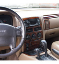 jeep grand cherokee 2001 woodland brown sati suv laredo gasoline 8 cylinders 4 wheel drive automatic with overdrive 07730