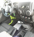 jeep wrangler 2012 green suv sport gasoline 6 cylinders 4 wheel drive 6 speed manual 34731