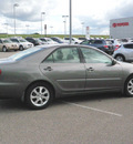 toyota camry 2006 gray sedan xle v6 gasoline 6 cylinders front wheel drive automatic with overdrive 56001