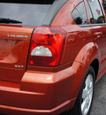 dodge caliber 2009 orange hatchback sxt gasoline 4 cylinders front wheel drive automatic 33021