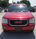 gmc envoy xuv 2004 red suv slt gasoline 8 cylinders 4 wheel drive automatic 76087