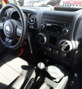 jeep wrangler 2012 orange suv sport gasoline 6 cylinders 4 wheel drive 6 speed manual 60915