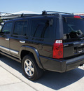 jeep commander 2010 black suv gasoline 6 cylinders 2 wheel drive automatic 76087