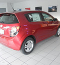 chevrolet sonic 2012 red hatchback lt gasoline 4 cylinders front wheel drive automatic 55391
