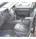 dodge charger 2008 black sedan sxt gasoline 6 cylinders rear wheel drive automatic 77065