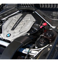 bmw x5 2011 black xdrive50i gasoline 8 cylinders all whee drive 6 speed manual 77002