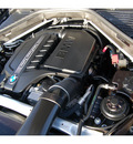 bmw x5 2011 black xdrive35i gasoline 6 cylinders all whee drive automatic 77002