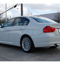 bmw 3 series 2009 white sedan 335xi gasoline 6 cylinders all whee drive automatic 77002