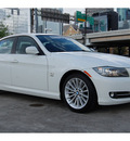bmw 3 series 2009 white sedan 335xi gasoline 6 cylinders all whee drive automatic 77002