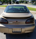 pontiac grand prix 1999 brown sedan gt gasoline 6 cylinders front wheel drive 4 speed automatic 76206
