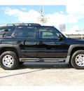 chevrolet tahoe 2005 black suv z71 gasoline 8 cylinders 4 wheel drive automatic 77002