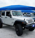 jeep wrangler unlimited 2011 silver suv sport gasoline 6 cylinders 4 wheel drive automatic 76206