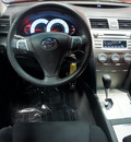 toyota camry 2011 black sedan se gasoline 4 cylinders front wheel drive automatic 76116