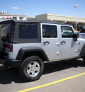 jeep wrangler 2012 silver suv unlimited sport gasoline 6 cylinders 4 wheel drive automatic 79925