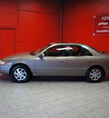 toyota camry 1999 beige sedan xle v6 gasoline 6 cylinders front wheel drive automatic with overdrive 76116