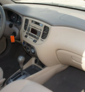 kia rio 2011 beige sedan lx gasoline 4 cylinders front wheel drive not specified 75080