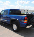 gmc sierra 1500 2004 blue slt gasoline 8 cylinders 4 wheel drive automatic 76087