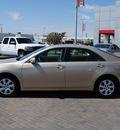 toyota camry 2011 gold sedan le gasoline 4 cylinders front wheel drive automatic 76087