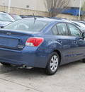 subaru impreza 2012 blue sedan 2 0i gasoline 4 cylinders all whee drive 5 speed manual 77099