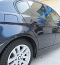 bmw 3 series 2006 black sedan 325i gasoline 6 cylinders rear wheel drive not specified 77099