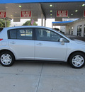nissan versa 2010 silver hatchback 1 8 s gasoline 4 cylinders front wheel drive not specified 77099