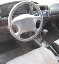 toyota corolla 1994 tan sedan gasoline 4 cylinders front wheel drive automatic 79925