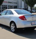 pontiac g6 2009 silver sedan gasoline 6 cylinders front wheel drive automatic with overdrive 77099