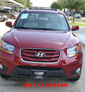 hyundai santa fe 2011 red limited gasoline 6 cylinders front wheel drive automatic 76051
